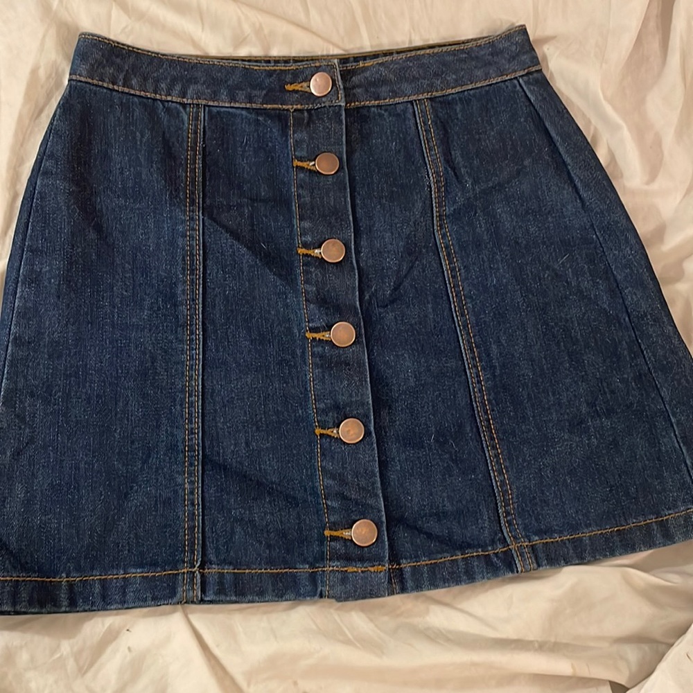 Dark denim skirt with button front detail